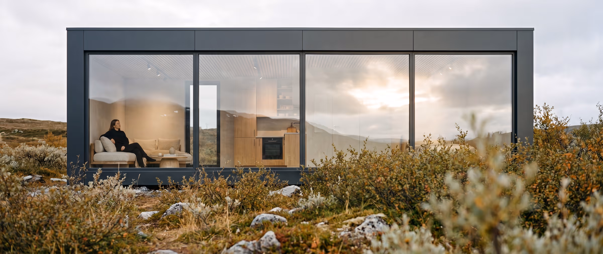 Infinity exterior, anthracite Alucobond and Lunawood Noir cladding