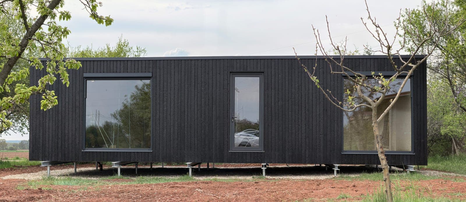 Sanctuary 142 m², photographed straight on as a wide panorama.